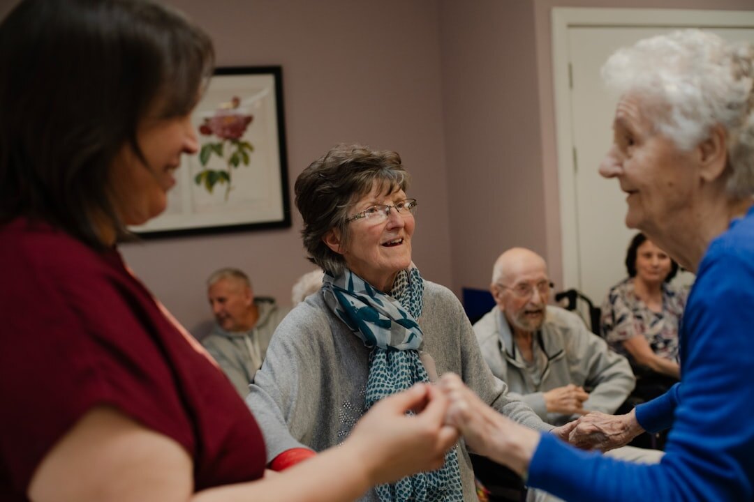 senior friends chatting warmly