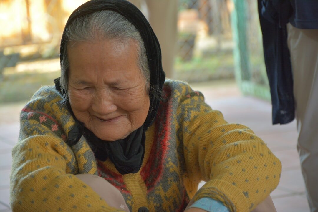 elderly woman smiling warmly